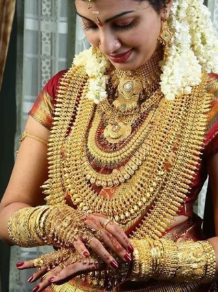 Indian woman with gold jewelry
