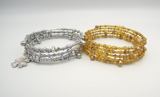 silver and gold bands